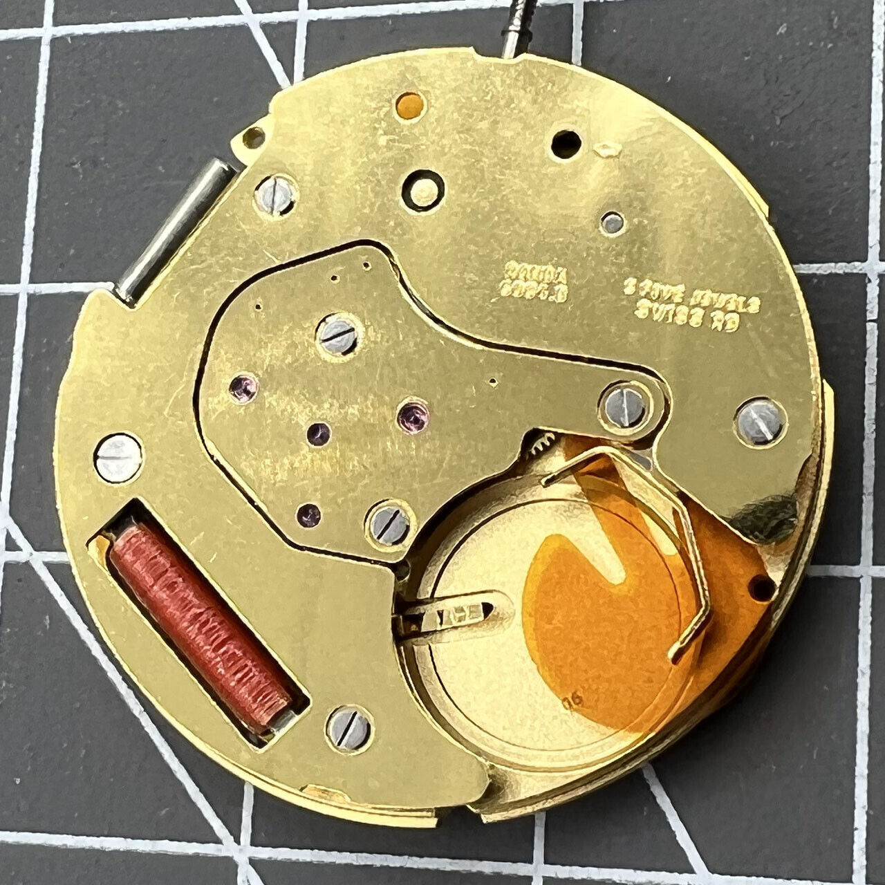 Swiss Made Ronda 6004D quartz watch movement with date display at 3 o?clock, precision timing accessory by Ronda.
