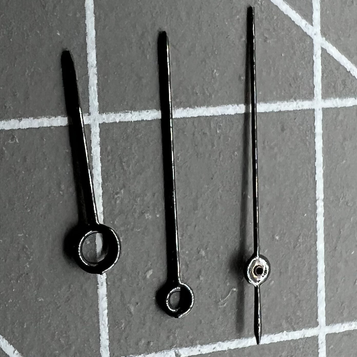 Black NO.1519 watch hands set for Miyota 2035, sizes 14mm/12mm/9mm, precision accessory.