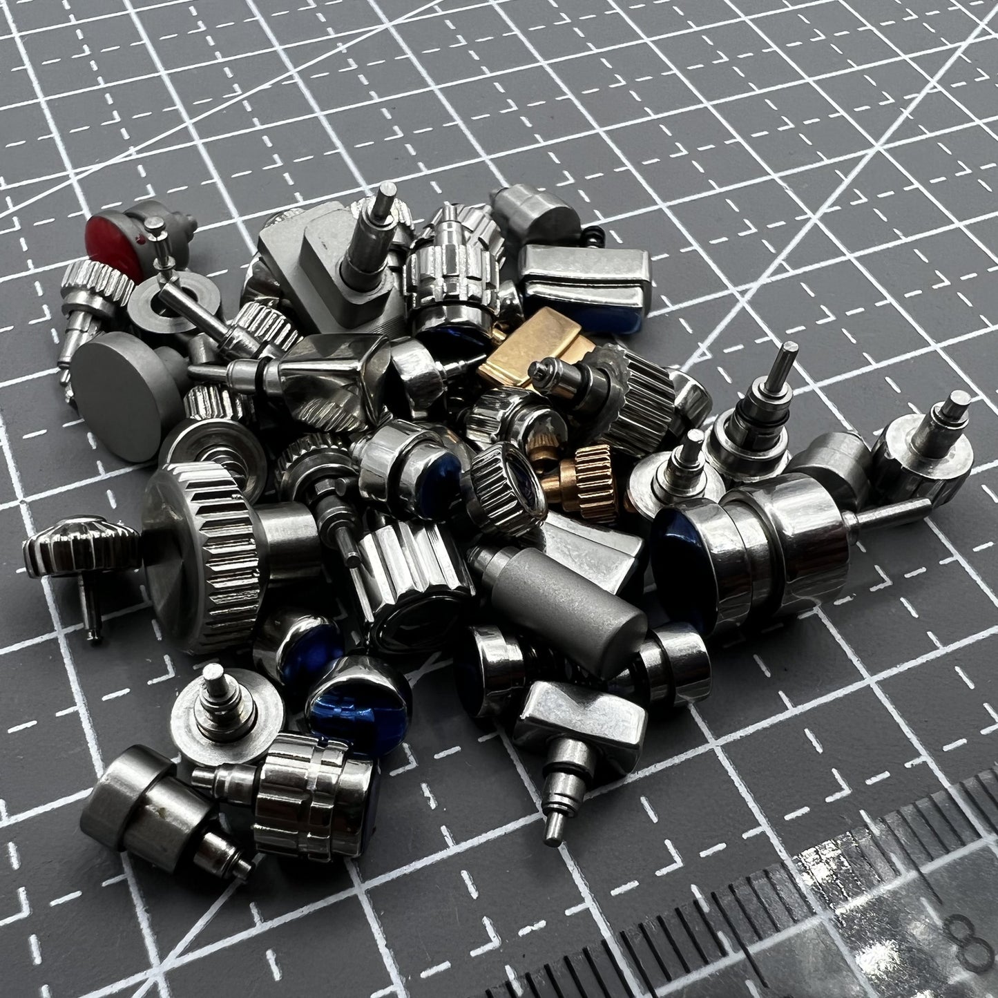 Mixed watch push buttons assortment, 50 pieces per pack, ideal for watch repair and replacement