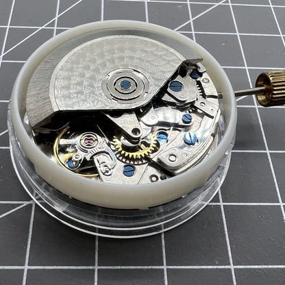 Asia Made 7750 black mechanical watch movement featuring single calendar and small seconds subdials at 3, 6, and 9 o'clock.