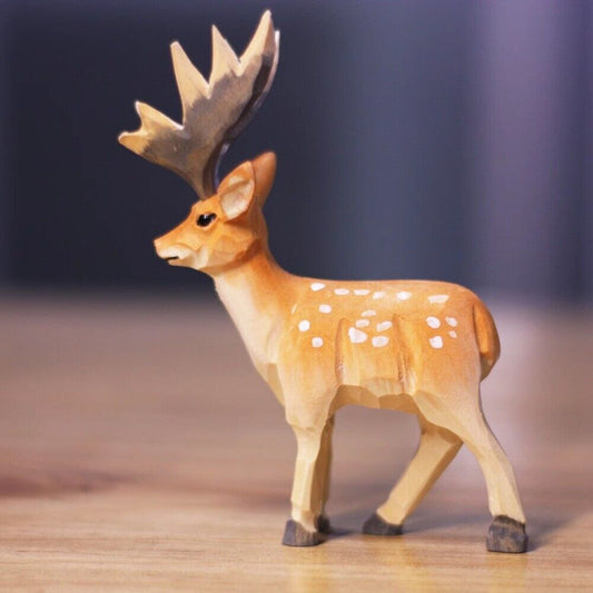 Handmade standing deer wooden figurine by New Cute, perfect decorative artwork for home or office shelves.