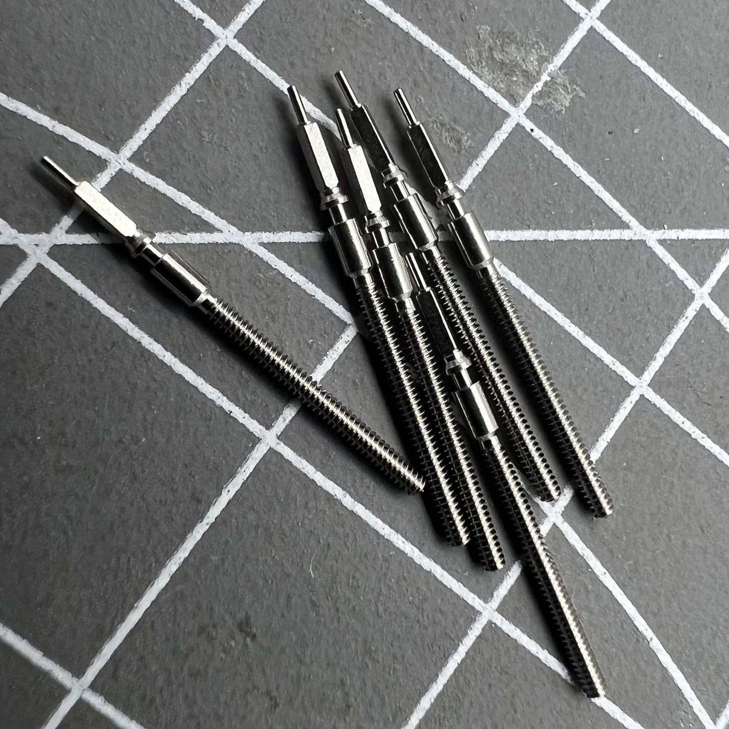 Watch winding stem for Shanghai 2824 movement, high-quality replacement part for precise timekeeping.