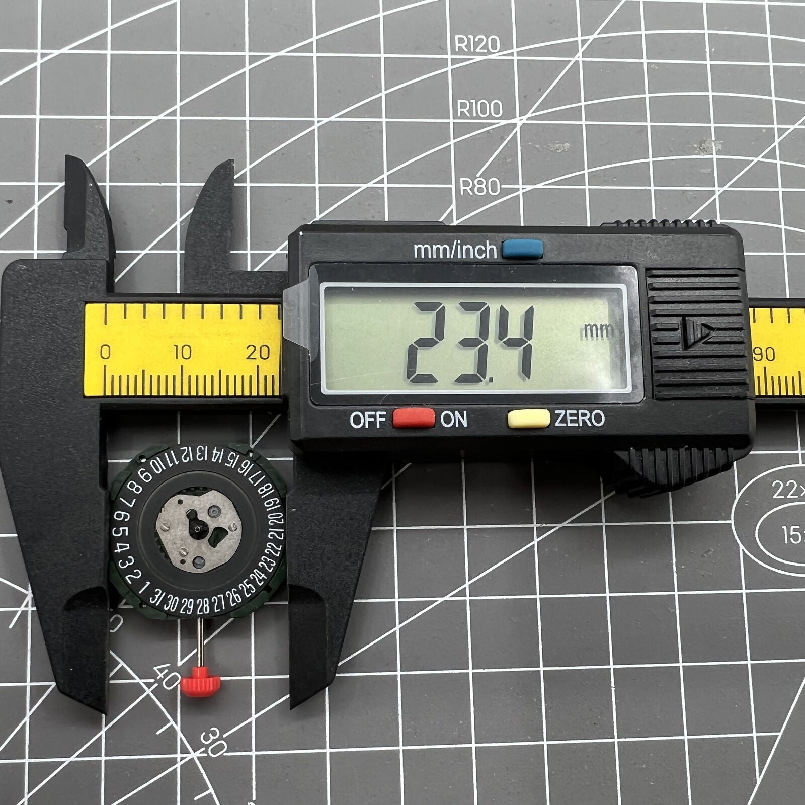 Black dial watch with Miyota 2315 quartz, 3 hands, date at 6, featuring watch stem.