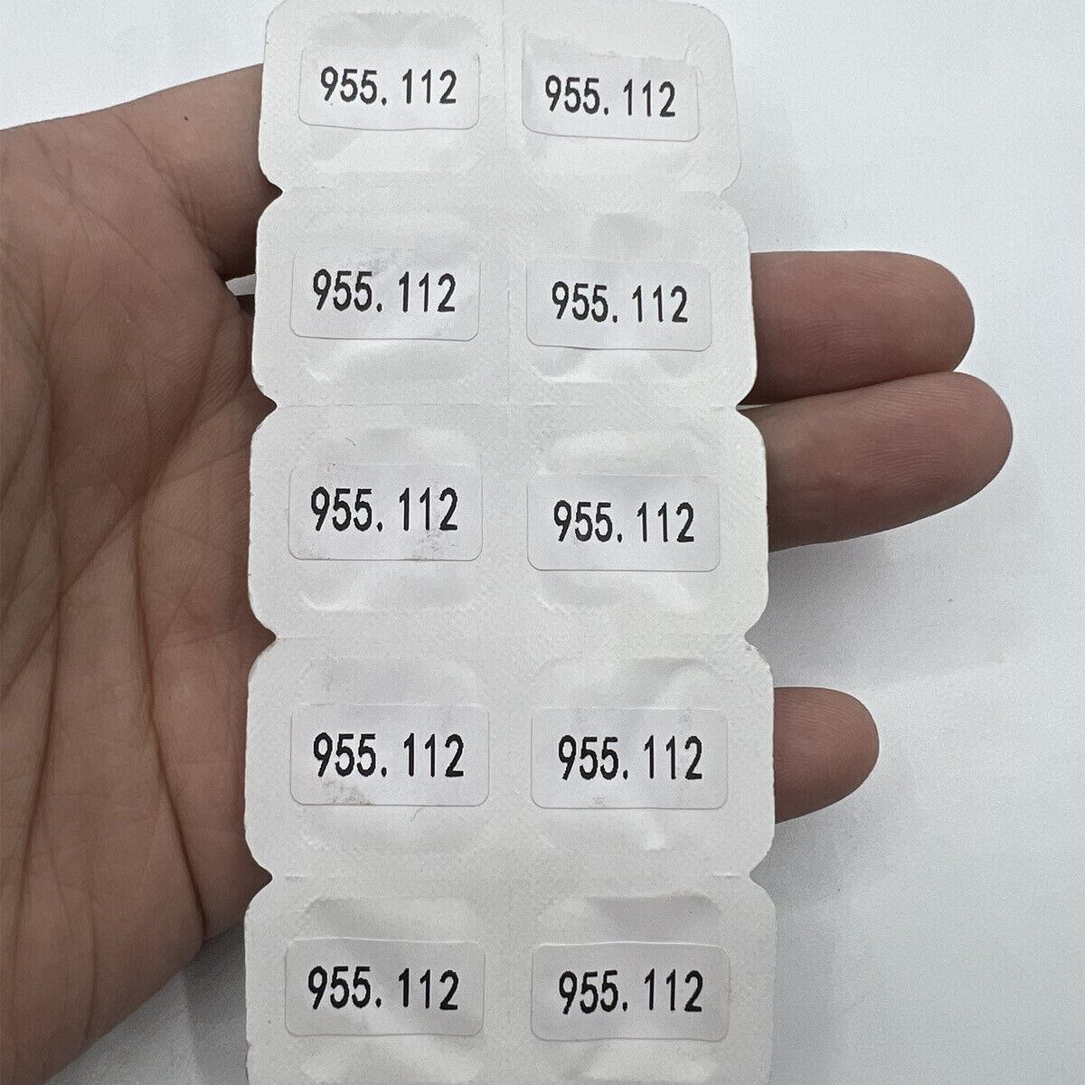 Set of 10 Swiss New Generic watch winding stems for ETA 955.112 and 956.112 movements, ideal for repairs.