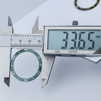 SUB 33.65x27.3mm flat ceramic bezel insert for women's watch customization by SUB brand.