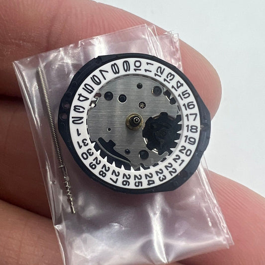 Set of 3 Hattori Epson PC22 quartz watch movements with date display at 3 and 6 o?clock, Japan made.