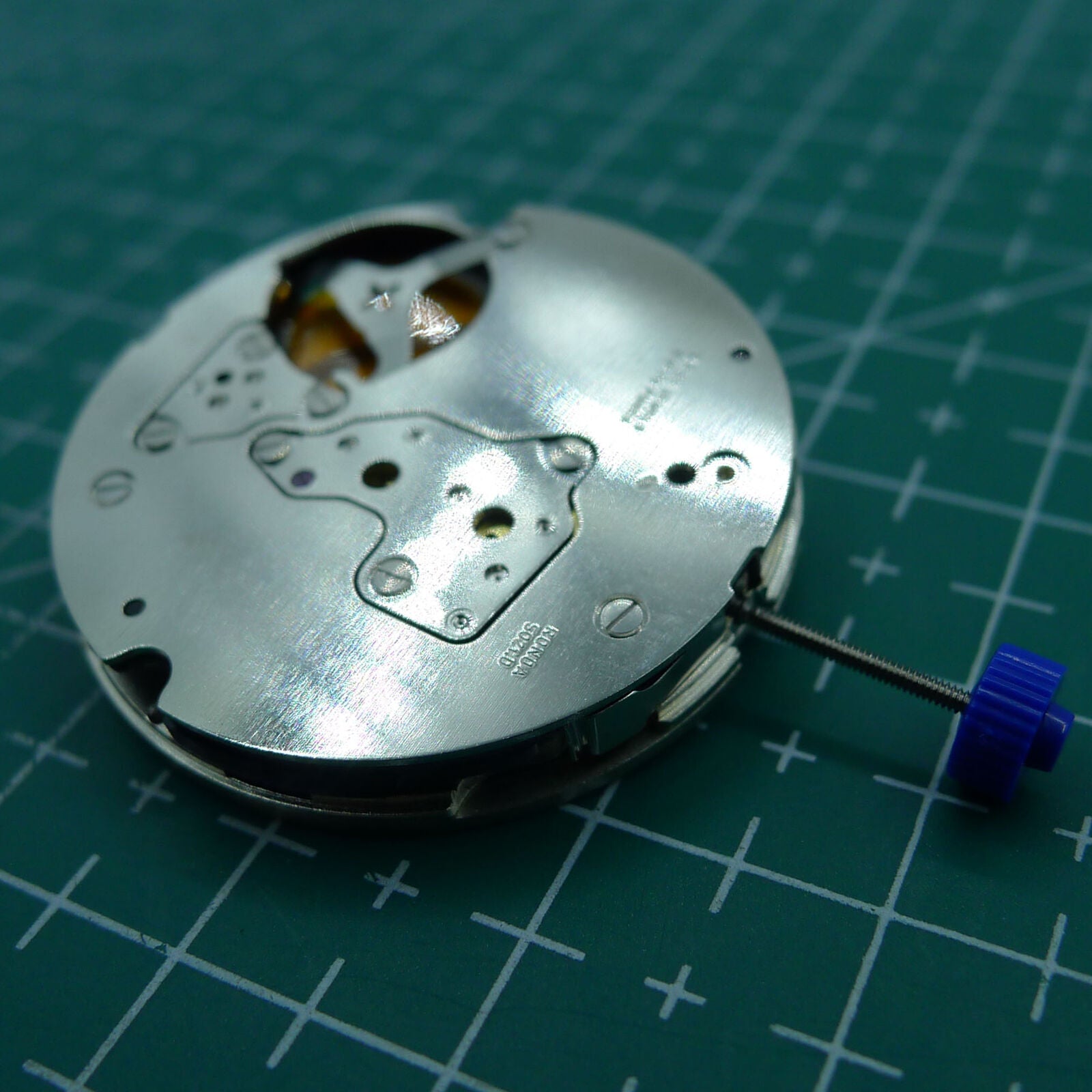 Ronda 5021D Swiss quartz watch movement with date display at 6, perfect for precise watch repairs.