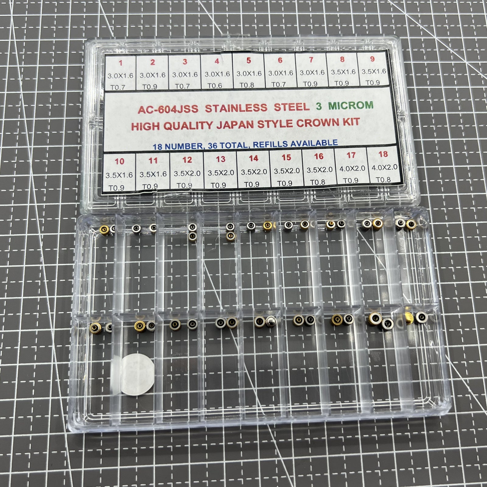 Set of 36 stainless steel watch crowns by Japan Style, ideal for high-quality watch repairs and replacements.