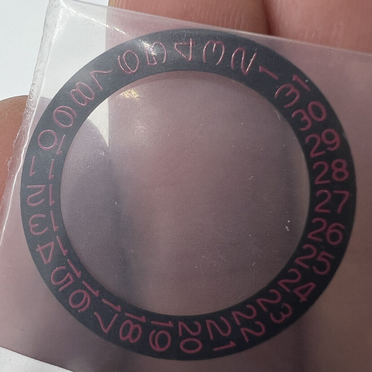 Red date disk for NH35 NH36 watch movement on black background, compatible with Seiko watches.