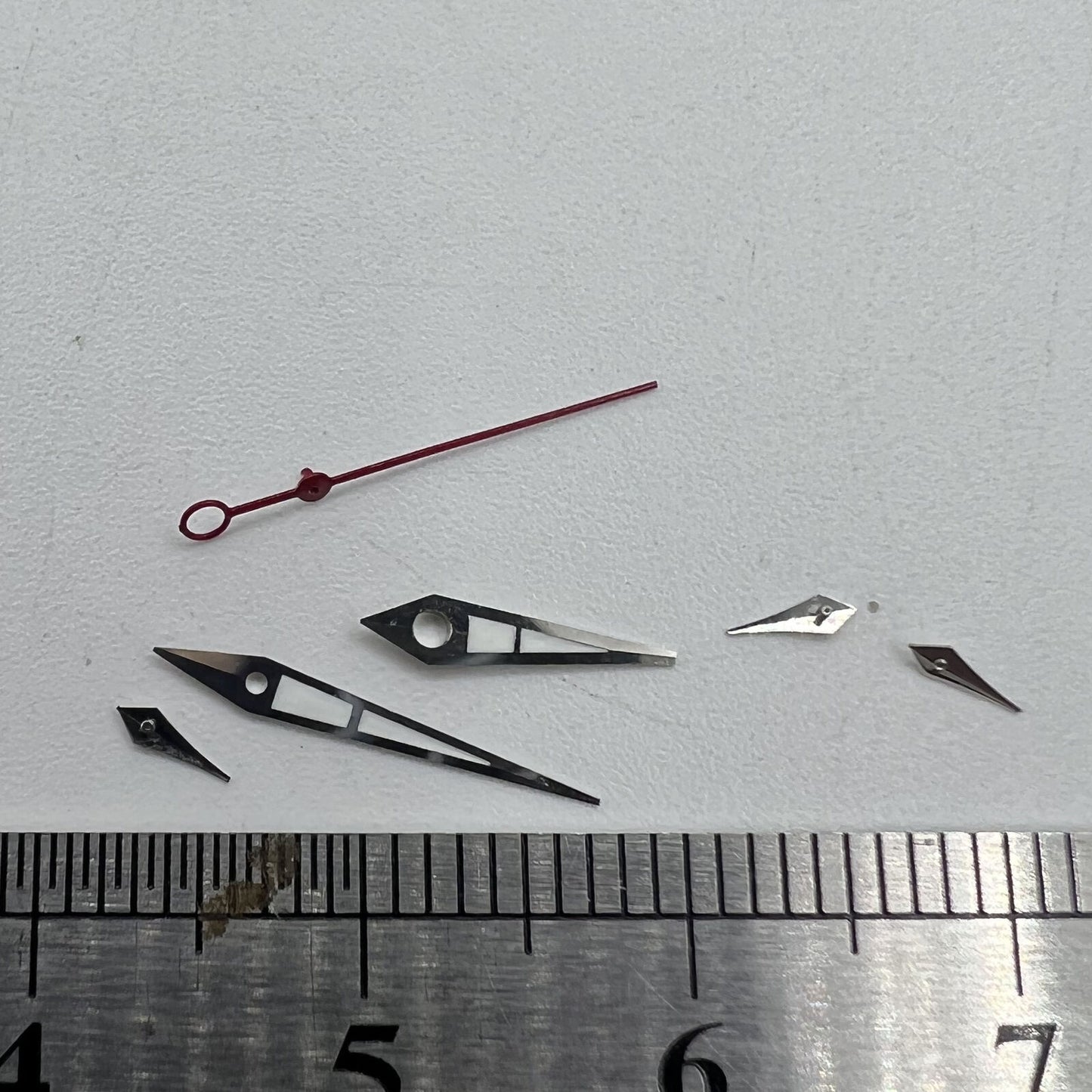 Green luminous watch hands with silver trim, 11.5mm size for ISA 9238 quartz movements.