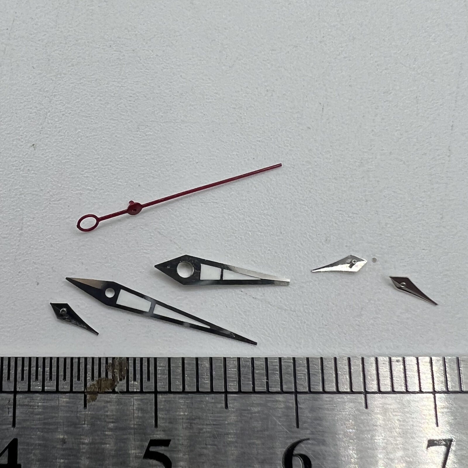 Green luminous watch hands with silver trim, 11.5mm size for ISA 9238 quartz movements.