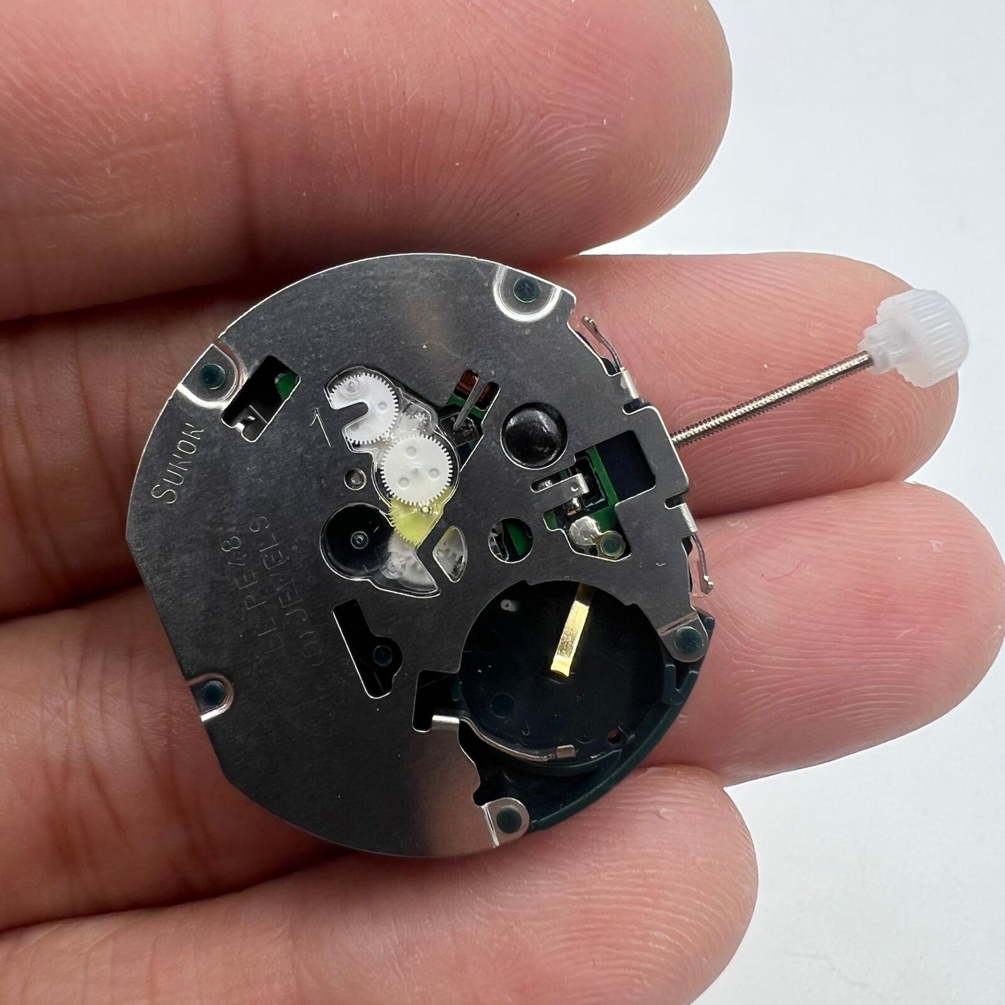 Sunon PE48 quartz watch movement with date at 3 o'clock and small second at 6 for accurate timekeeping