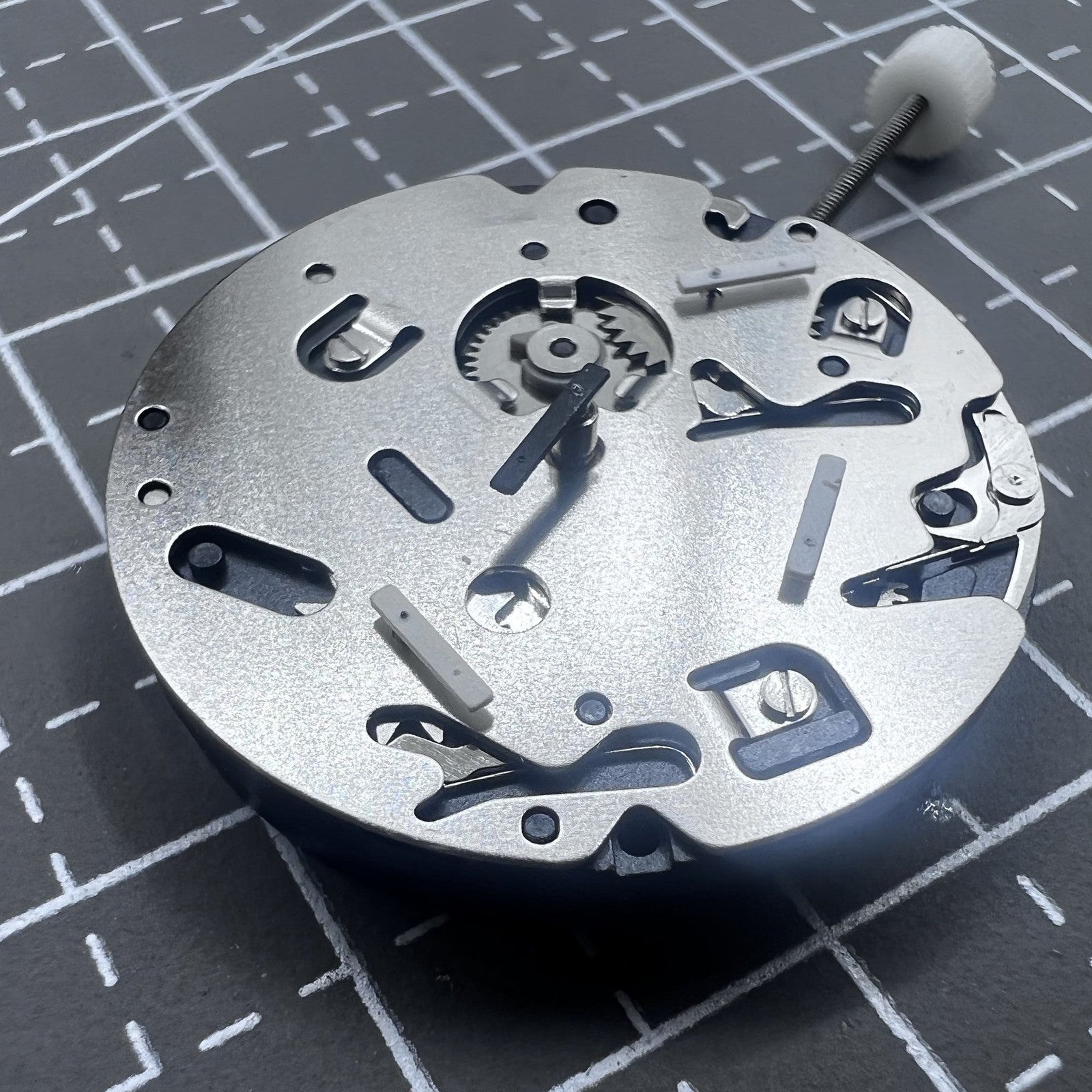 Swiss ISA 9238 quartz movement with 6 hands, multifunctional watch mechanism for precise timekeeping.