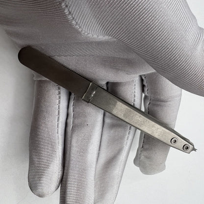 Precision Bergeon 7825 spring bar tweezer for watch lug removal and fitting accessories.