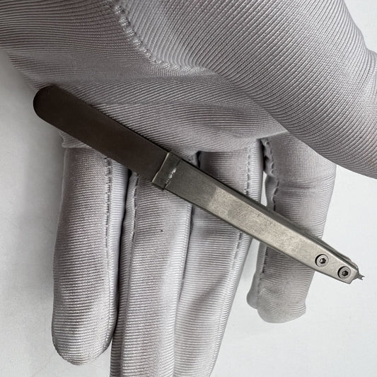 Precision Bergeon 7825 spring bar tweezer for watch lug removal and fitting accessories.