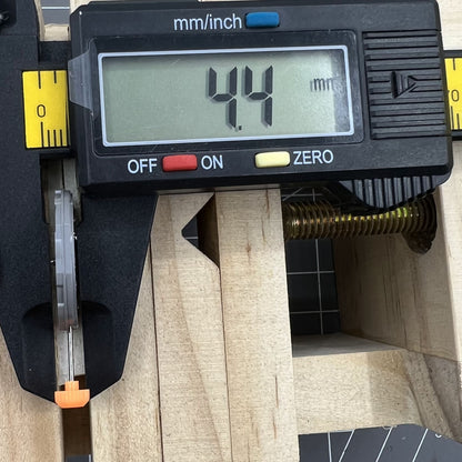 Miyota 1M52 quartz watch movement with date at 12 o'clock and three hands for accurate timekeeping.
