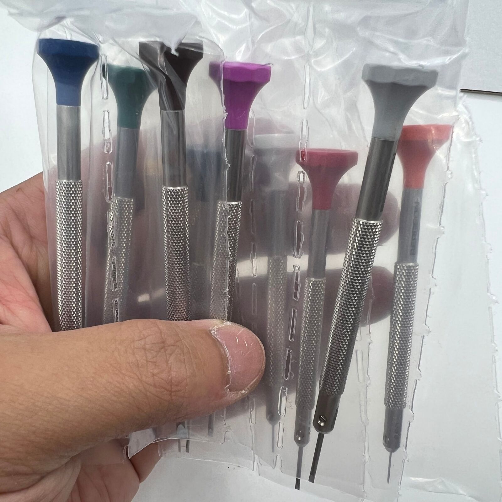 Swiss Bergeon 30081-S10 ergonomic screwdriver set with rotating stand for precise watch accessory repairs.