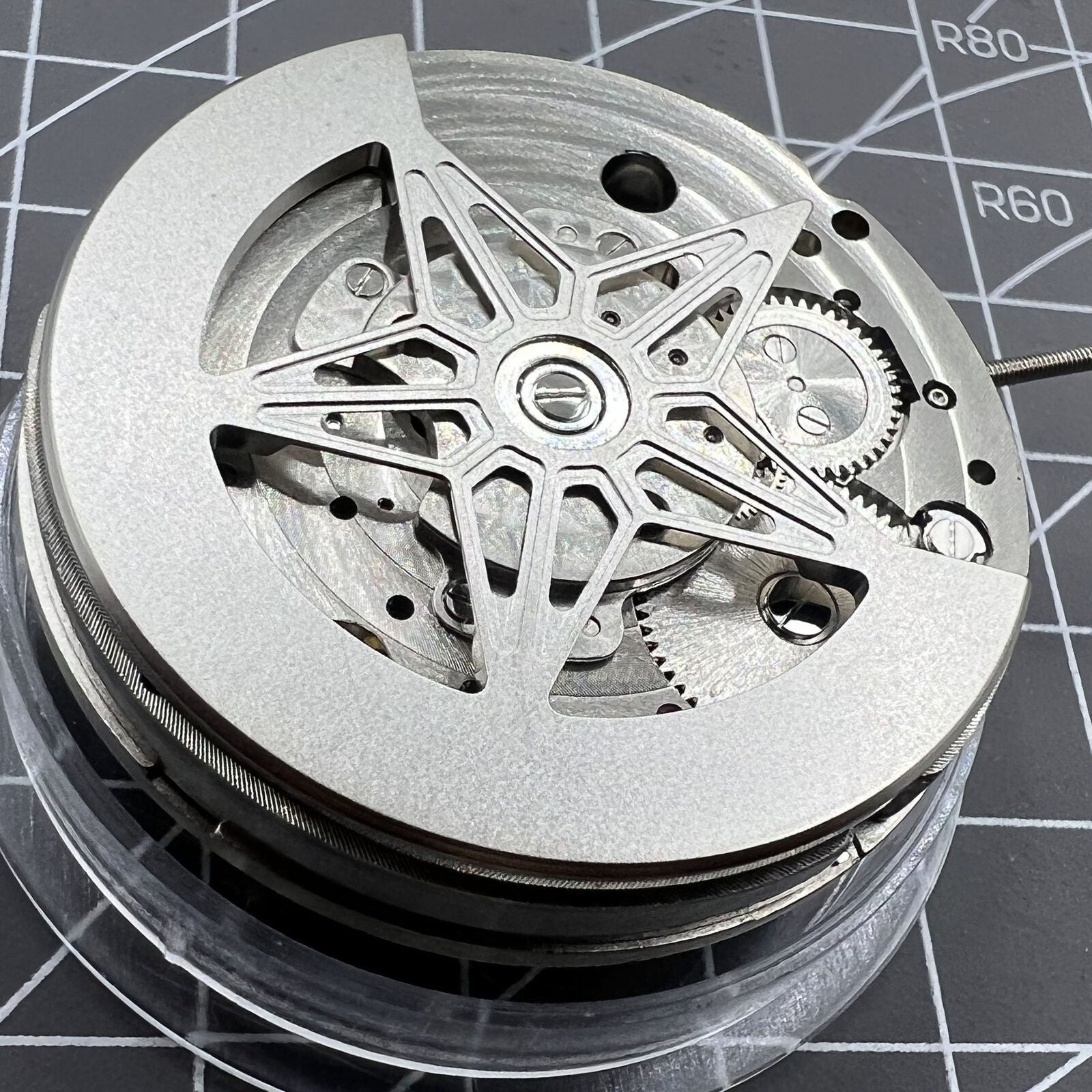 Dandong Silver Hollow Star Moon Phase watch showcasing elegant mechanical design by China Made.