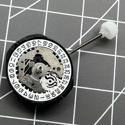 Sunon SL25 quartz watch movement with 3 hands, date window at 3 and 6 o'clock positions.
