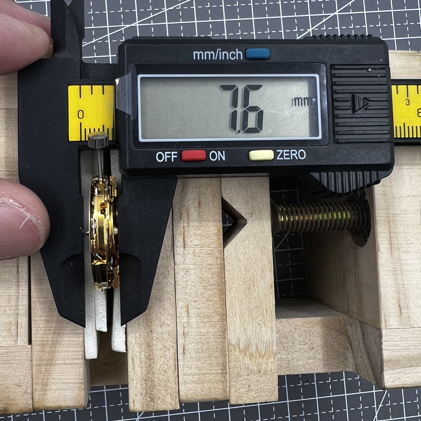 Polished gold Tianjin T16 mechanical watch movement, compatible with Miyota 8200, precision replacement part.