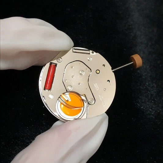 Ronda 6003B Swiss quartz watch movement with date at 12, ideal for precise watch repair parts.