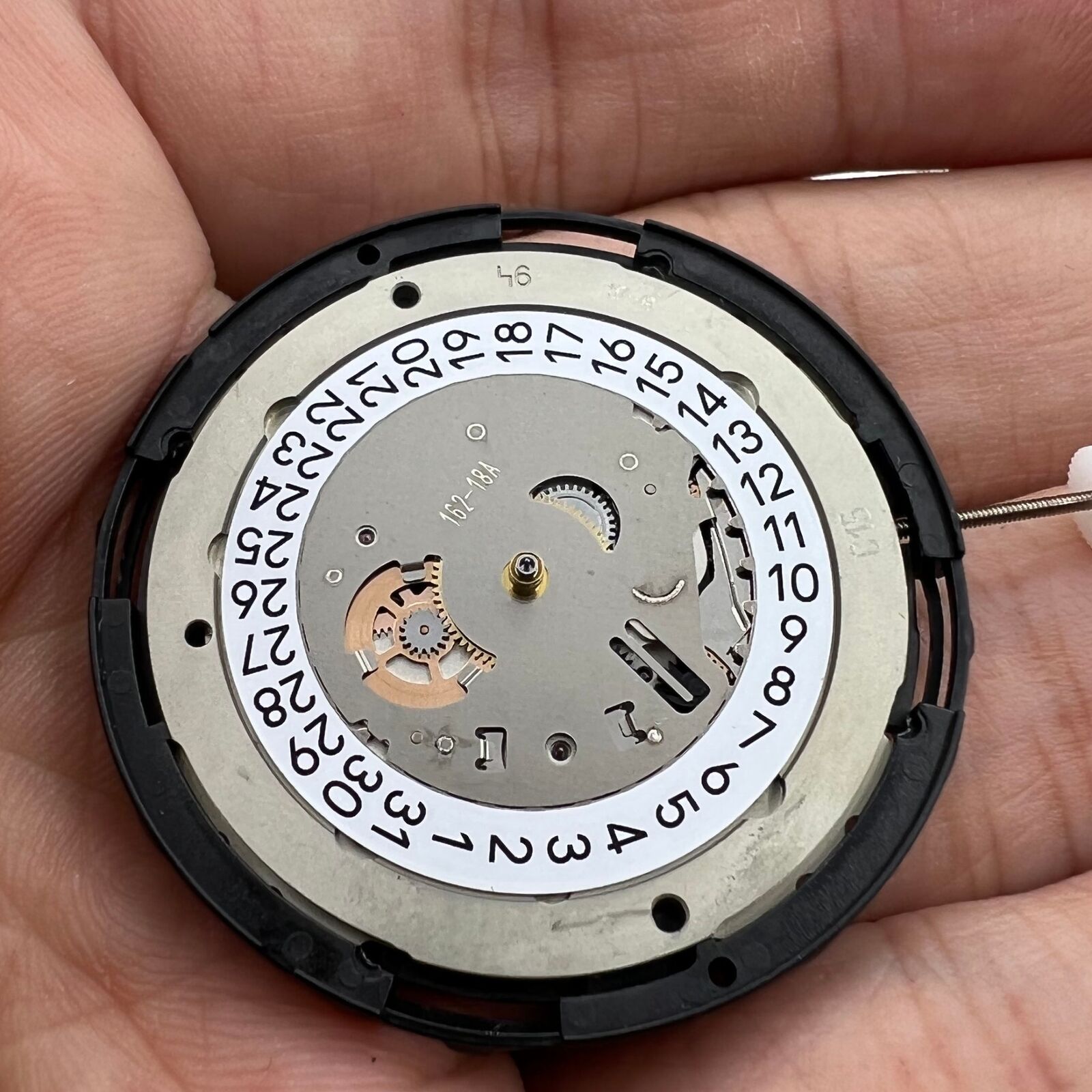 ETA C15.111 chronograph mechanical watch movement with 1853 white dial, Swiss Made craftsmanship.