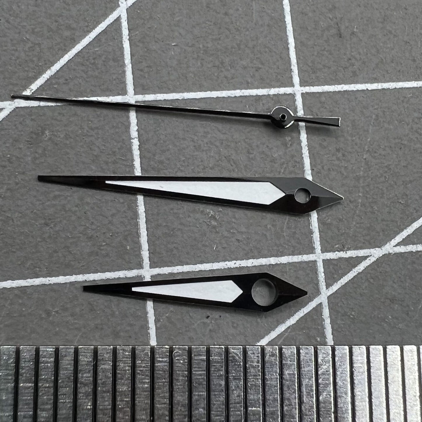 Black trim green luminous watch hands for NH35 NH36 movement, enhancing visibility, branded for precision.