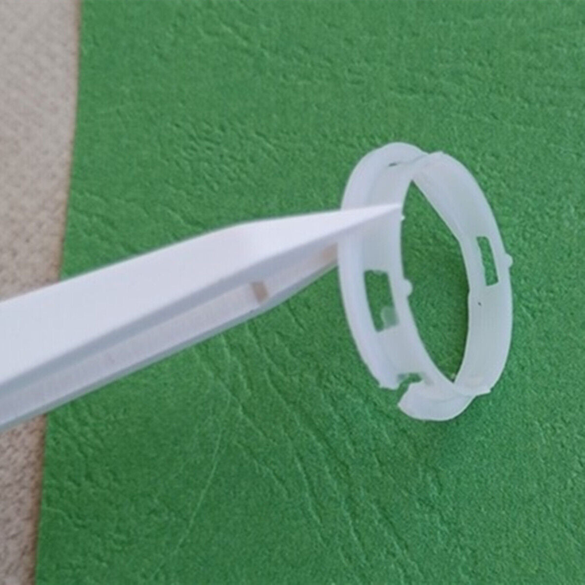 Watch case mounting spacer ring by Miyota, designed for precise fit on 2005 2115 movements, ensures secure assembly.