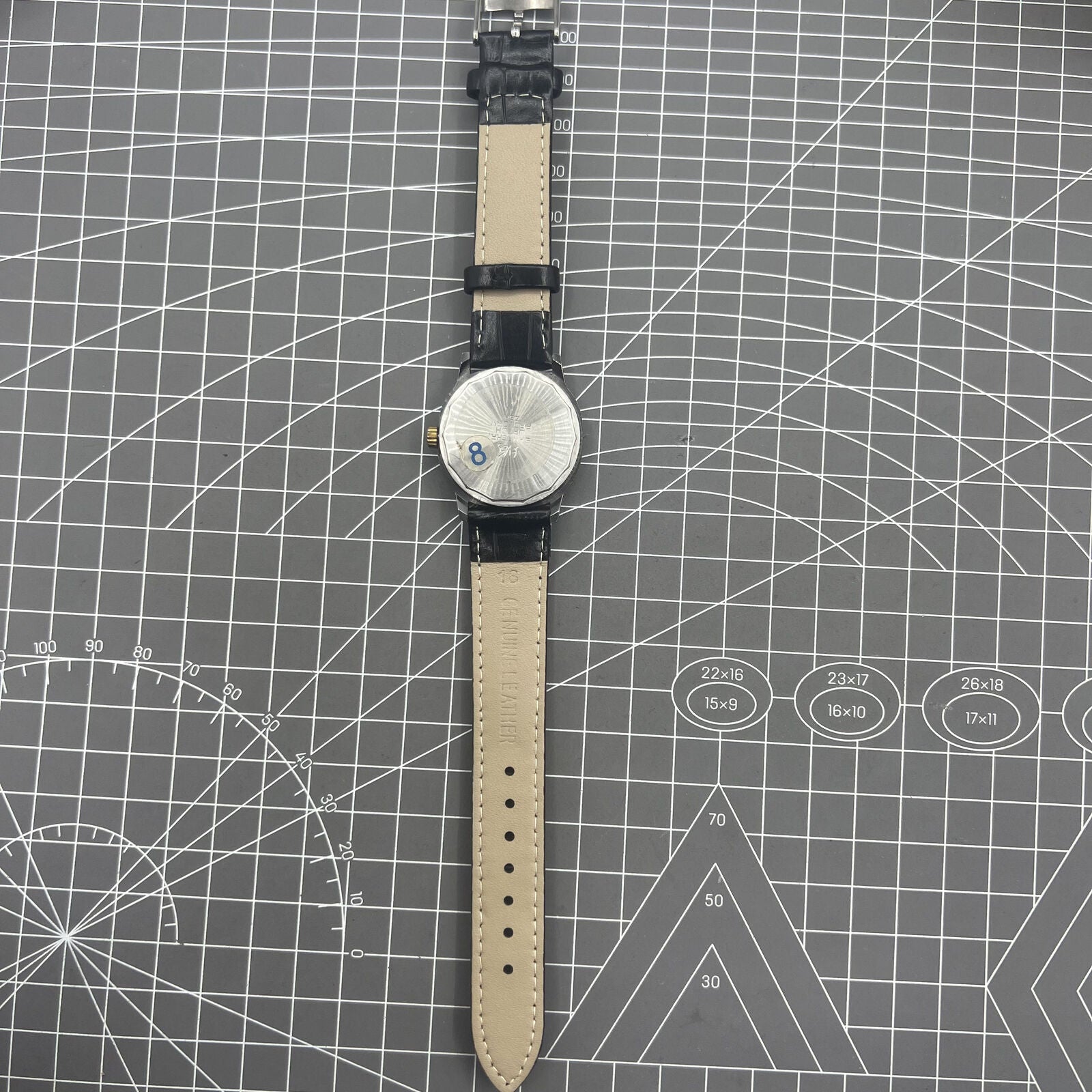 Shanghai Factory 34mm manual mechanical watch with black dial, 19 jewels, shock-resistant for daily wear.