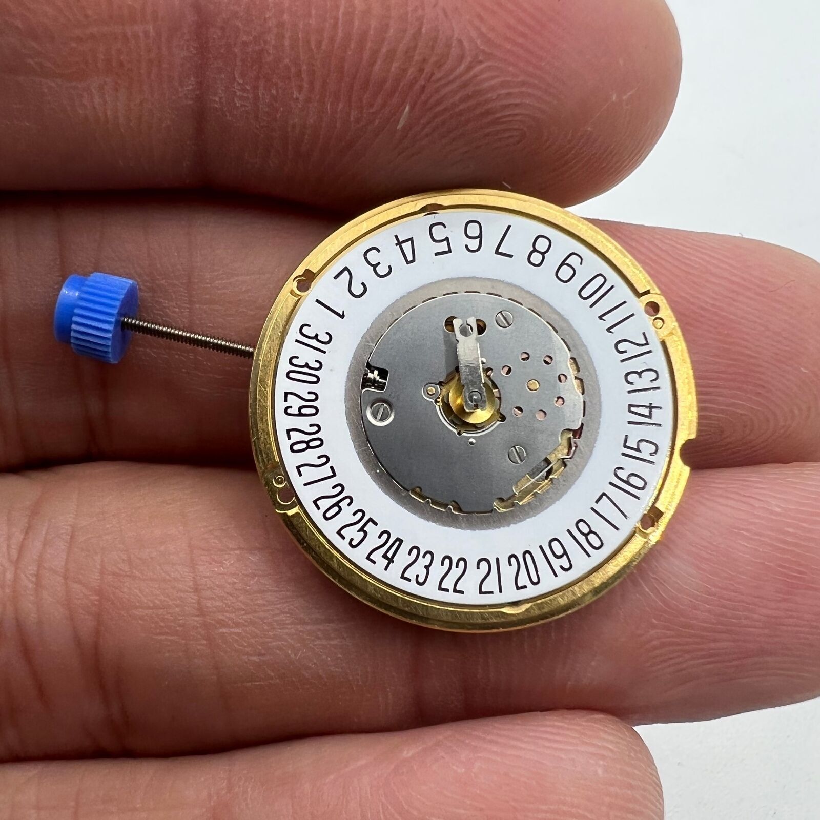 ETA F05.111 quartz watch with 2 hands, date at 6, precise movement, and minimalist style.