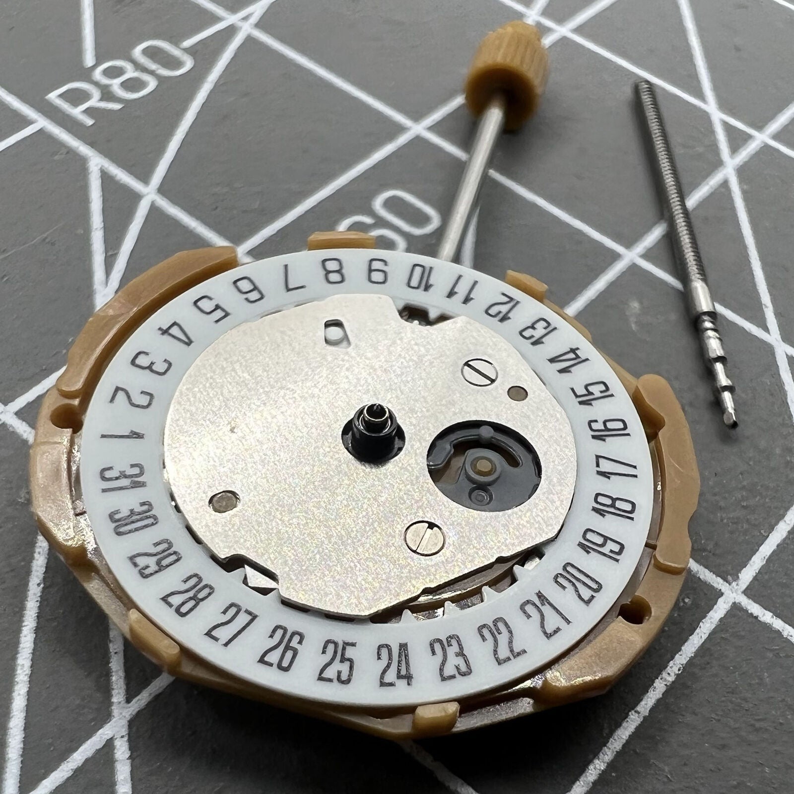 Japan Miyota GL10 quartz watch movement with 3 hands and date display at 6 o'clock, precise and reliable.