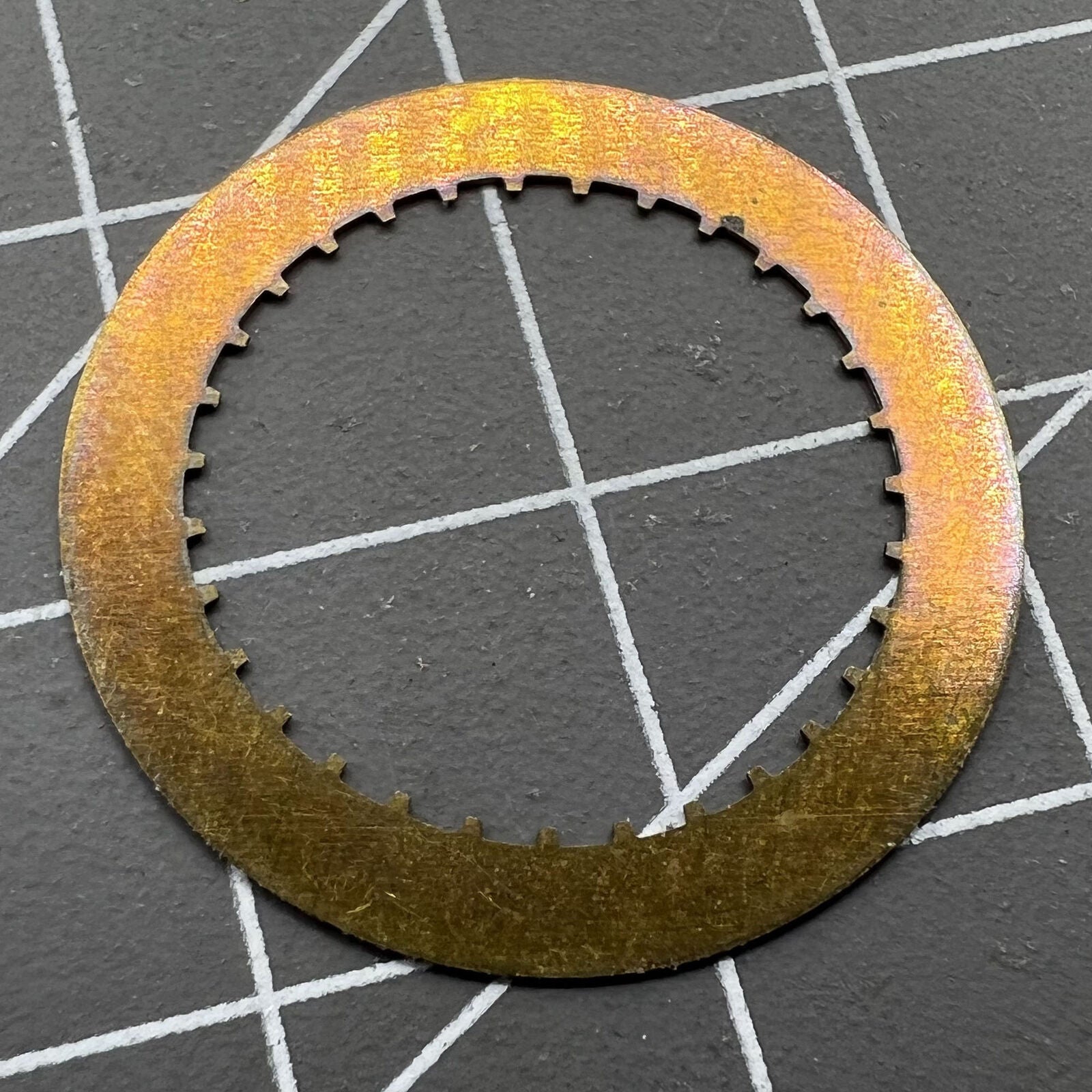 Arabic date disk wheel for ETA2824 Datejust watch, precision component on white background.