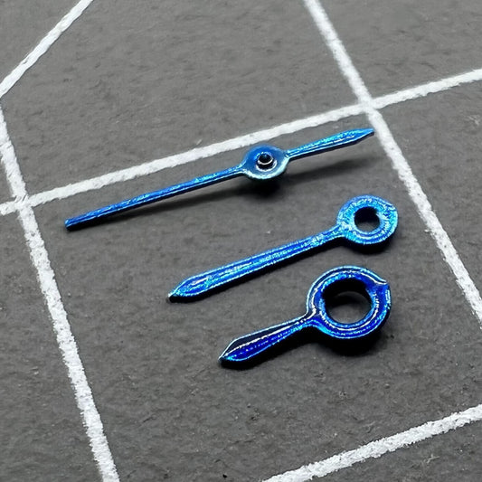 Blue 5mm watch hands designed for Hattori Epson VX82 quartz movement, enhancing timepiece precision.