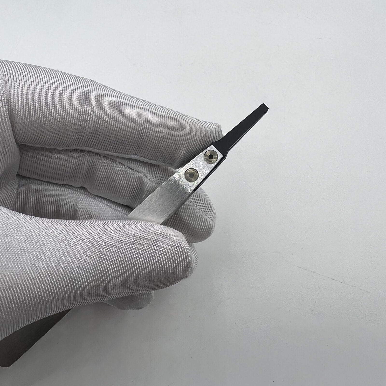 Horotec Swiss Made MSA12.711 carbon fibre tweezers with broad flat tips for precision watch accessory handling.