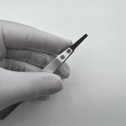 Horotec Swiss Made MSA12.711 carbon fibre tweezers with broad flat tips for precision watch accessory handling.