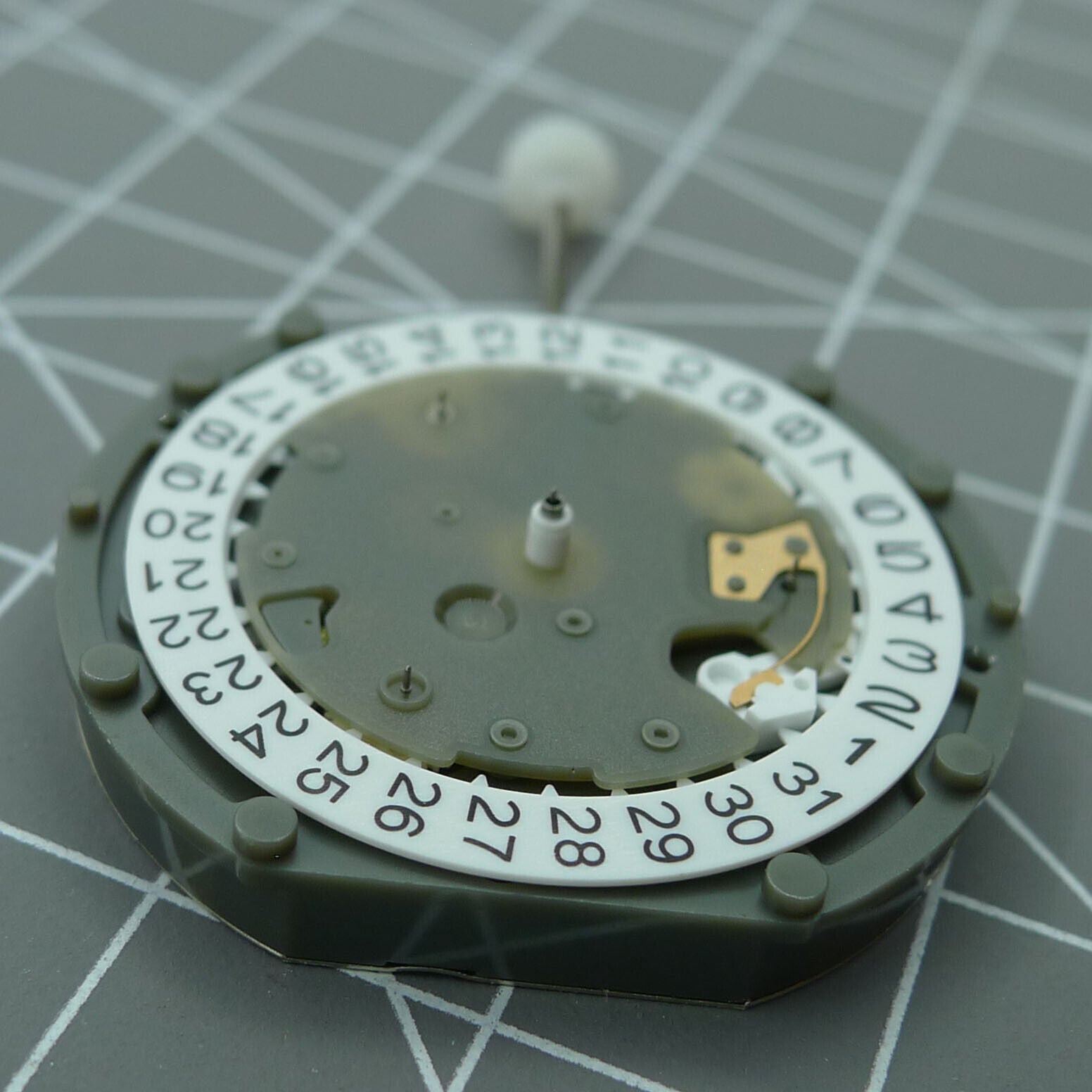 PE50 Quartz watch accessory with small second hand at 2, 6, and 10 o?clock, precision timepiece component.