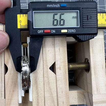 Automatic mechanical watch with reversed balance wheel and big date display, highlighting Bulova's precision craftsmanship.