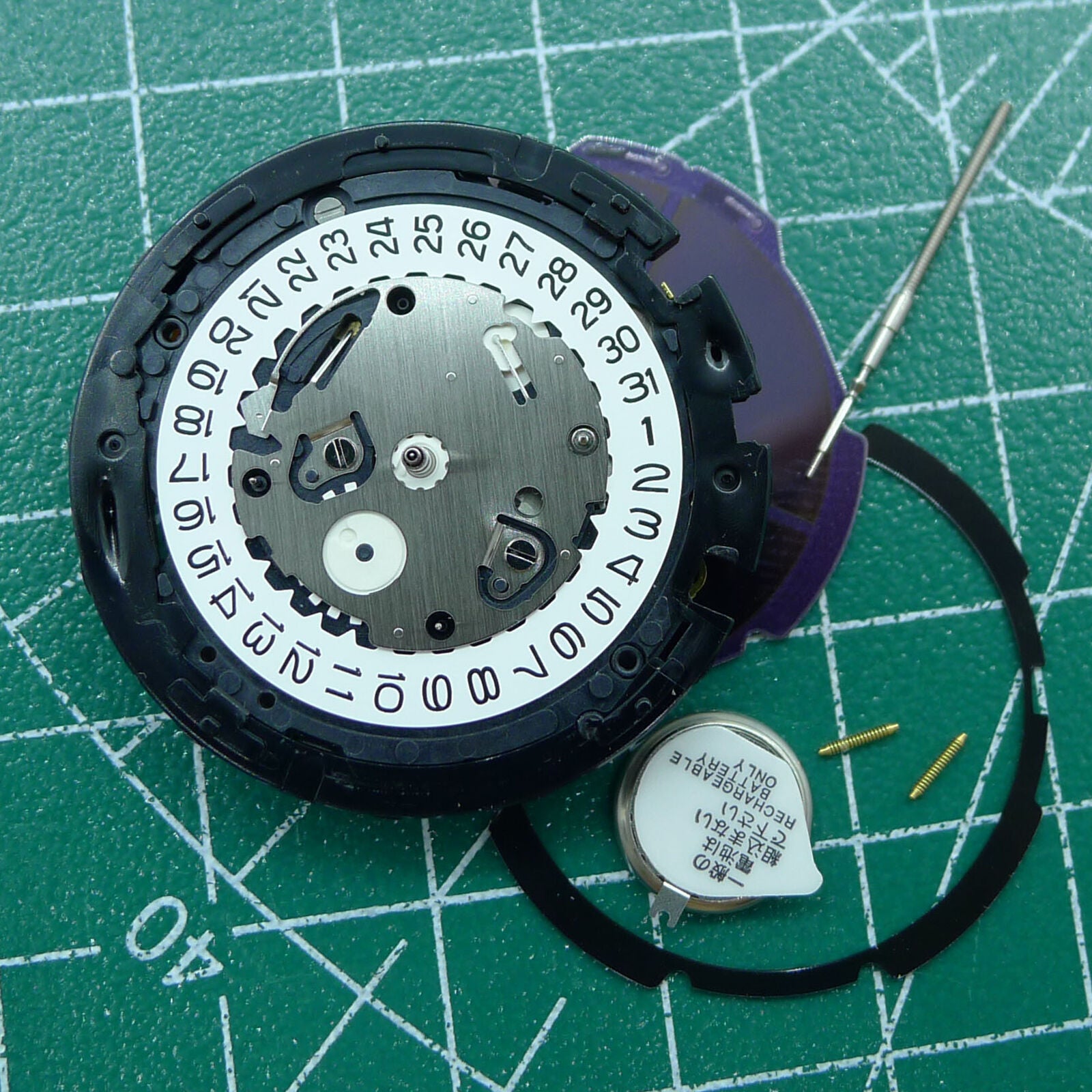 Hattori Epson TMI VS75B solar-powered quartz watch movement, precision Japanese craftsmanship.