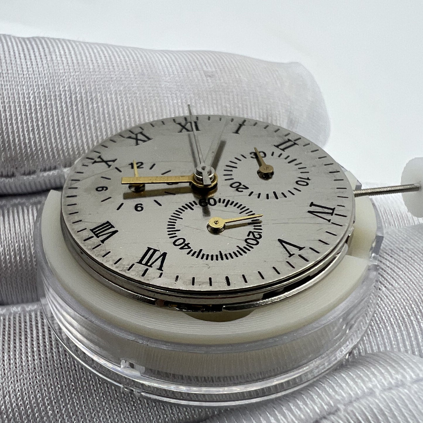 Close-up of China Made 7753 mechanical movement clone for Daytona watches, precision watch accessory.