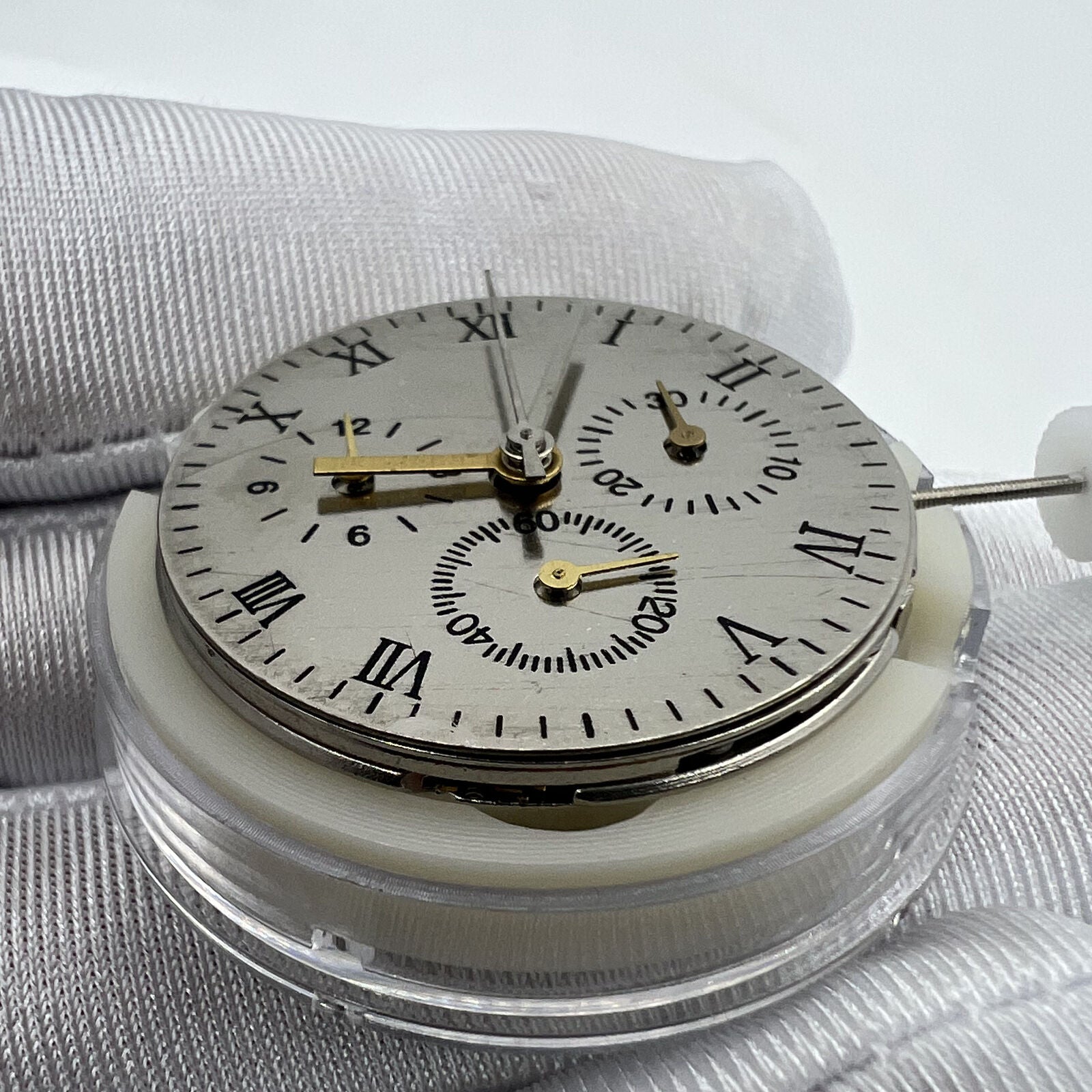 Close-up of China Made 7753 mechanical movement clone for Daytona watches, precision watch accessory.