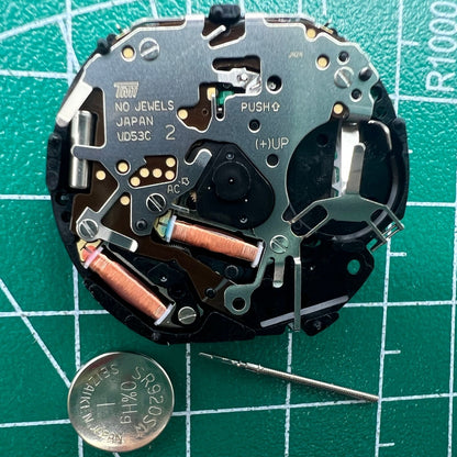 Hattori Epson TMI VD53C quartz watch movement showing date at 6 o'clock, ideal for watch accessories.