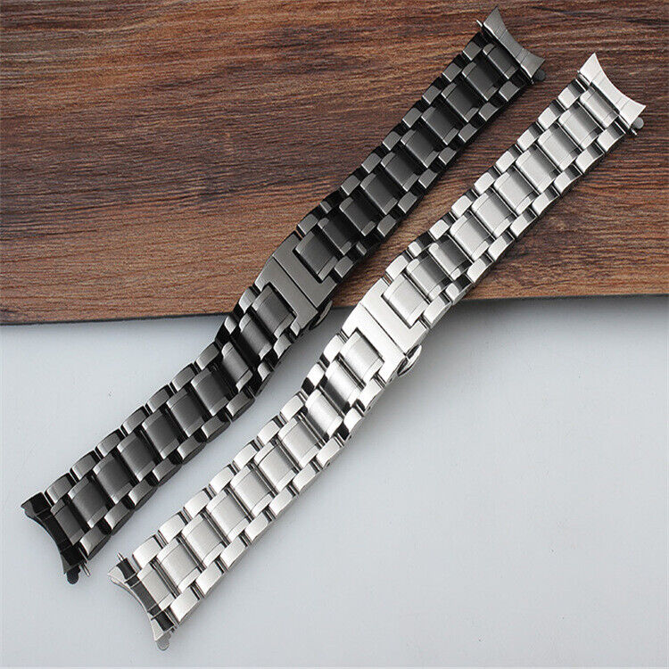 Curved end stainless steel watch band 20mm with butterfly clasp, durable strap for stylish watches.