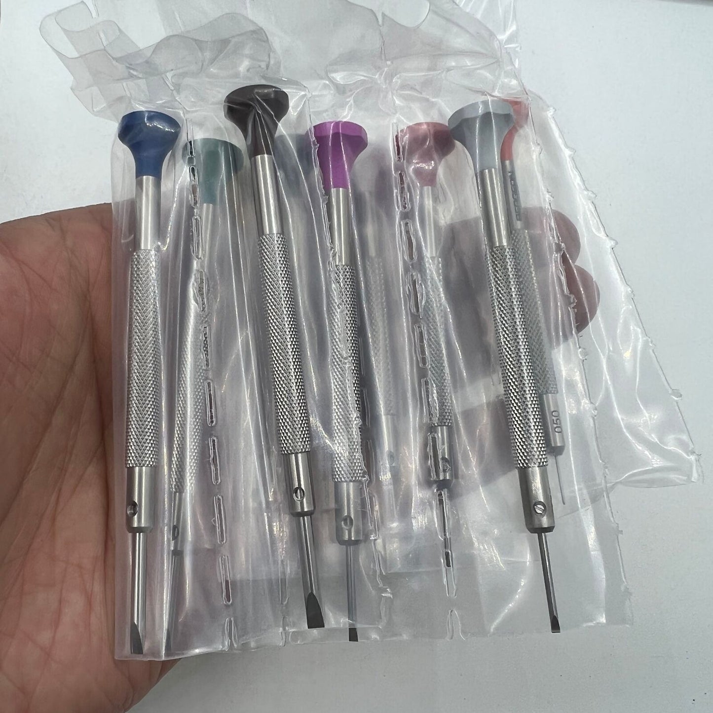 Swiss Bergeon 30081-S10 ergonomic screwdriver set with rotating stand for precise watch accessory repairs and adjustments.