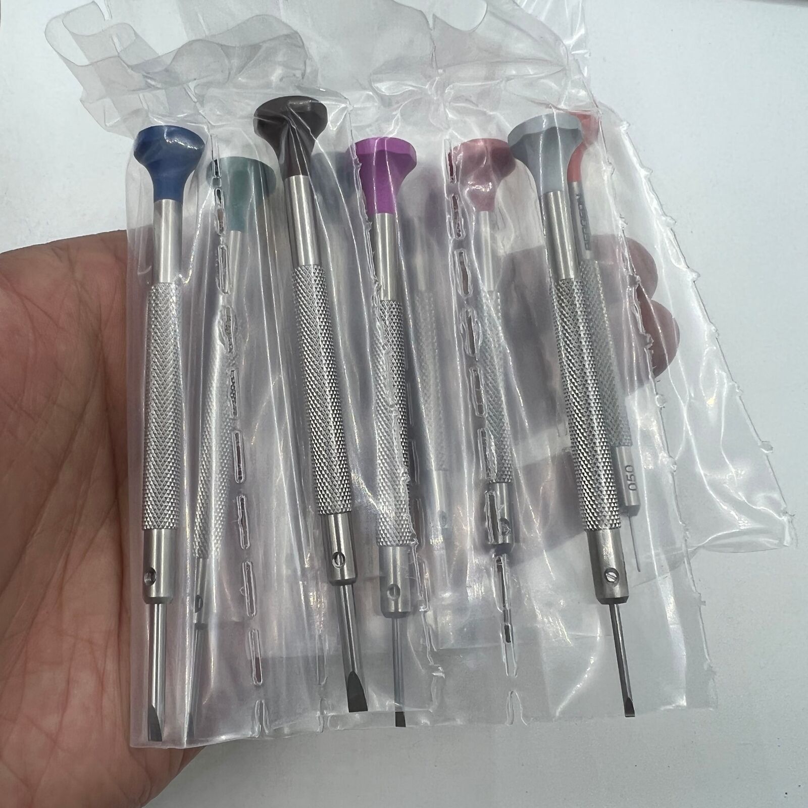 Swiss Bergeon 30081-S10 ergonomic screwdriver set with rotating stand for precise watch accessory repairs and adjustments.