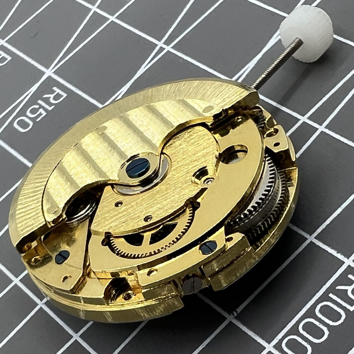 Generic 8205 mechanical watch skeleton dial with star phase, small seconds at 5 o?clock displaying intricate movement.