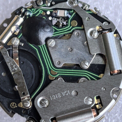 Swiss Made ISA 8161 watch with silver case, date at 4, and six multifunctional hands for precision timekeeping