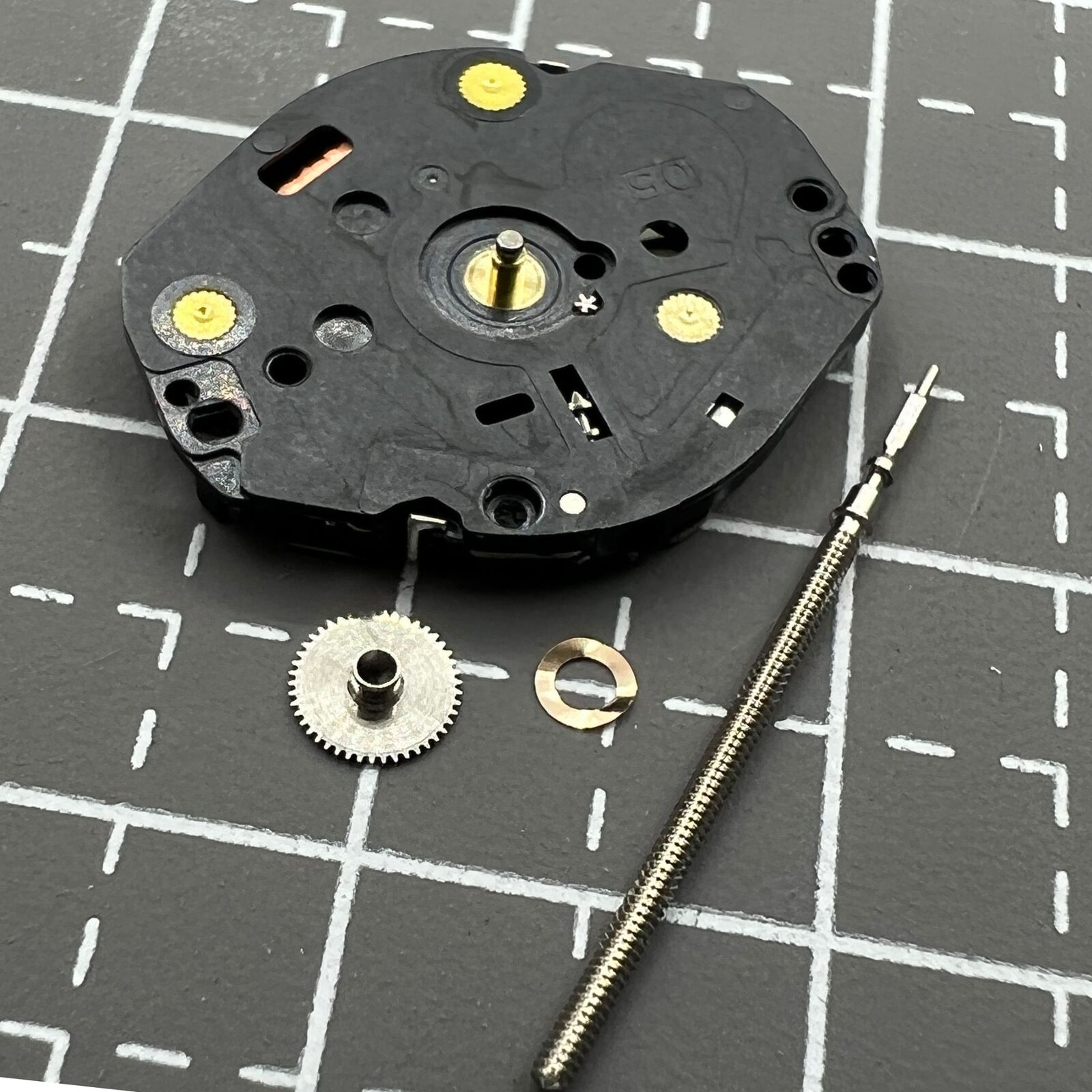 Hattori Epson TMI VX50 quartz watch movement by Japan Made for precise timekeeping in accessories.