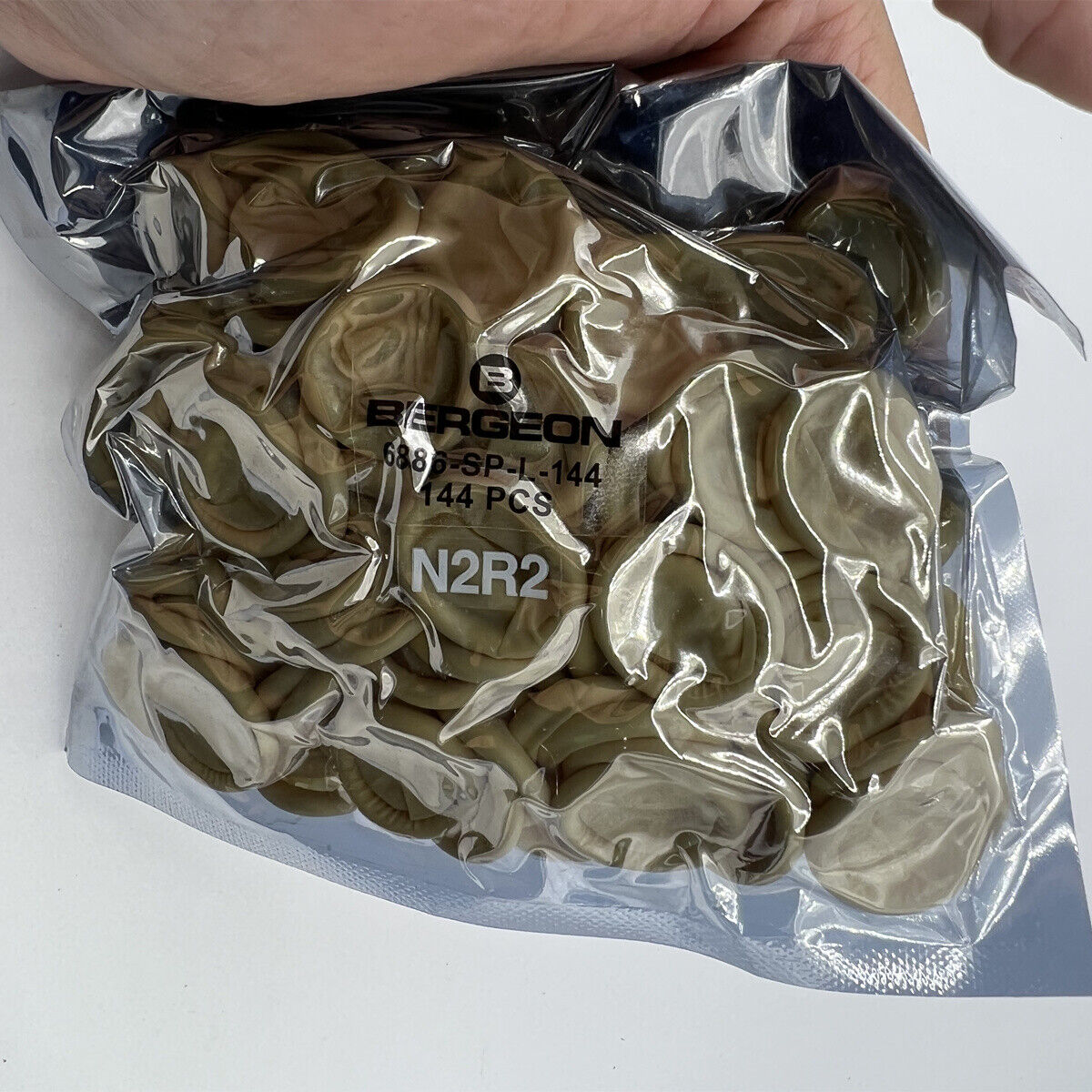 Set of 144 Bergeon rubber thimbles for finger protection during watchmaking and delicate assembly tasks.