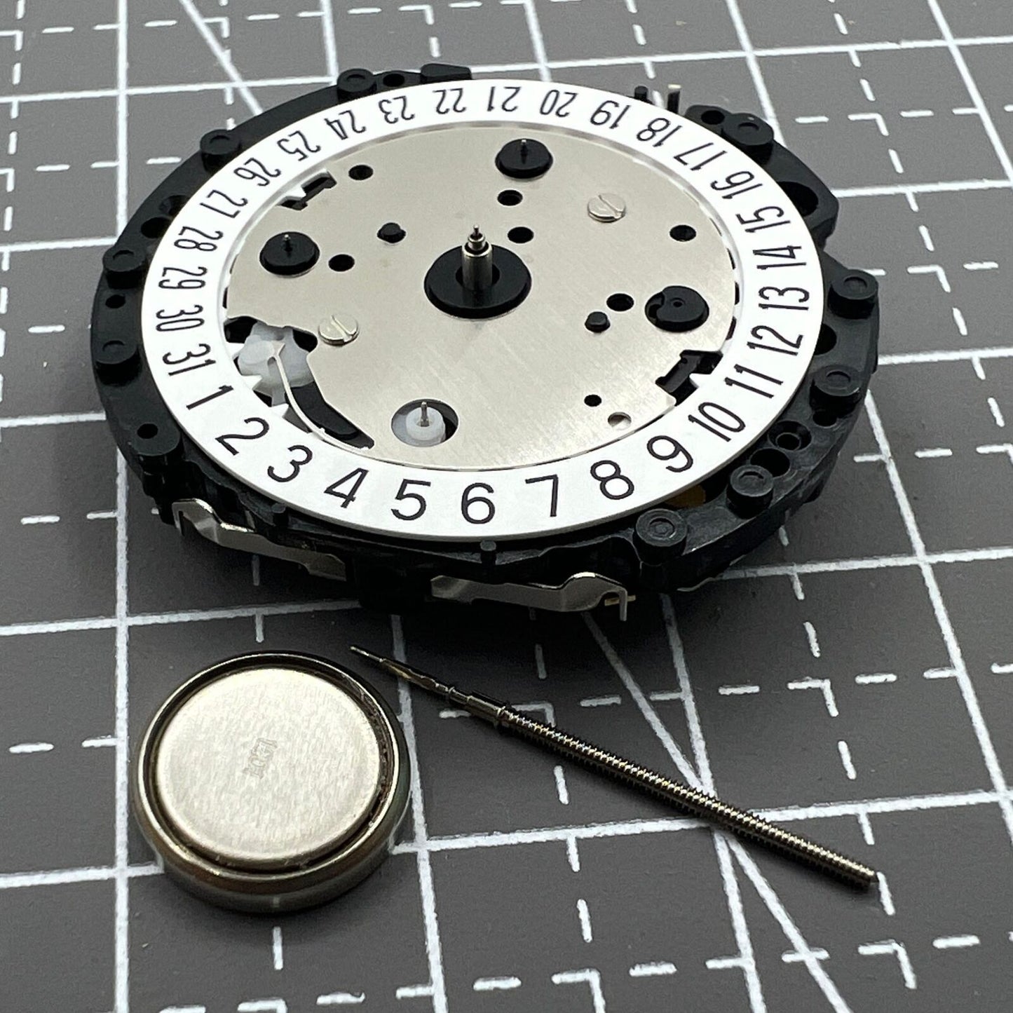 Hattori Epson VD53C precision quartz watch movement with date at 6, Japan-made repair component.