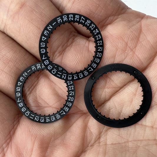 Black date disk with clear numerals, generic brand, compatible with Miyota 8215 watch movement, date at 3 o'clock.